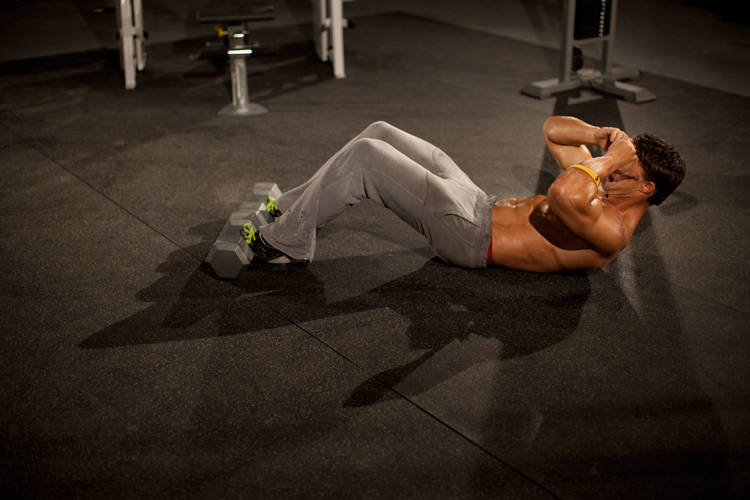 Demonstration of 3/4 Sit-Up exercise showing proper form and technique