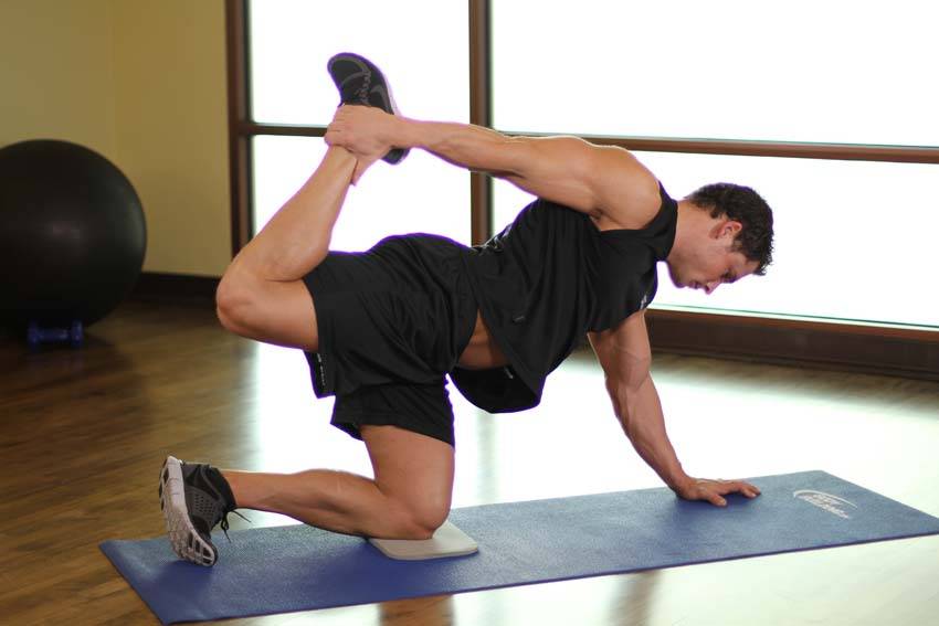Alternative demonstration of All Fours Quad Stretch exercise