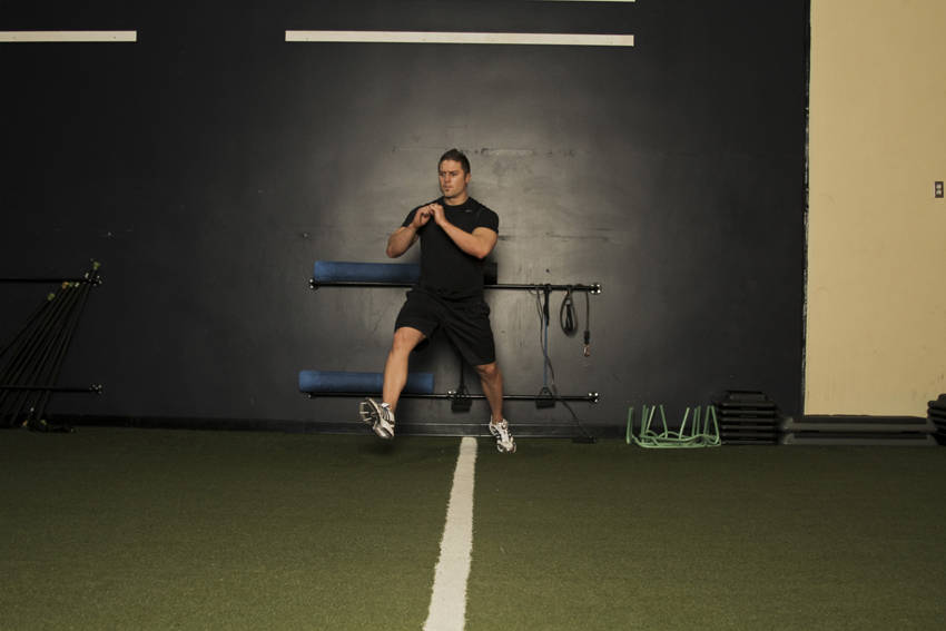 Demonstration of Alternate Leg Diagonal Bound exercise showing proper form and technique
