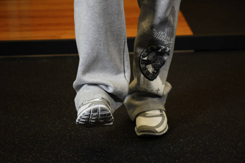 Demonstration of Ankle Circles exercise showing proper form and technique