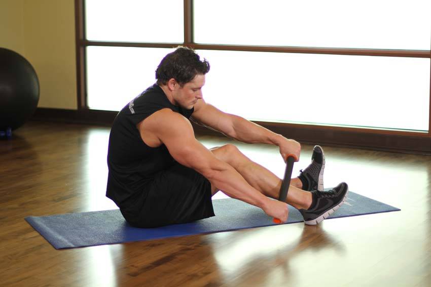 Demonstration of Anterior Tibialis-SMR exercise showing proper form and technique