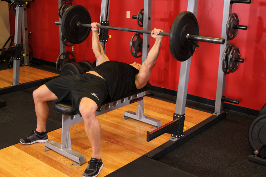 Demonstration of Barbell Bench Press - Medium Grip exercise showing proper form and technique