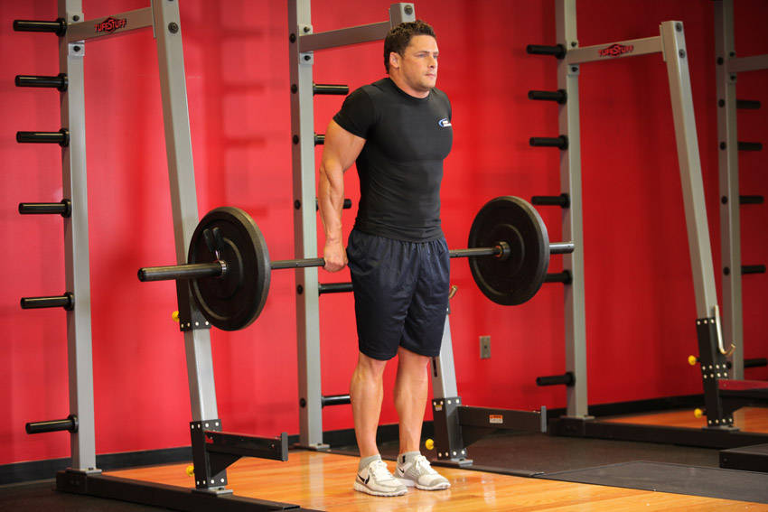Alternative demonstration of Barbell Shrug Behind The Back exercise