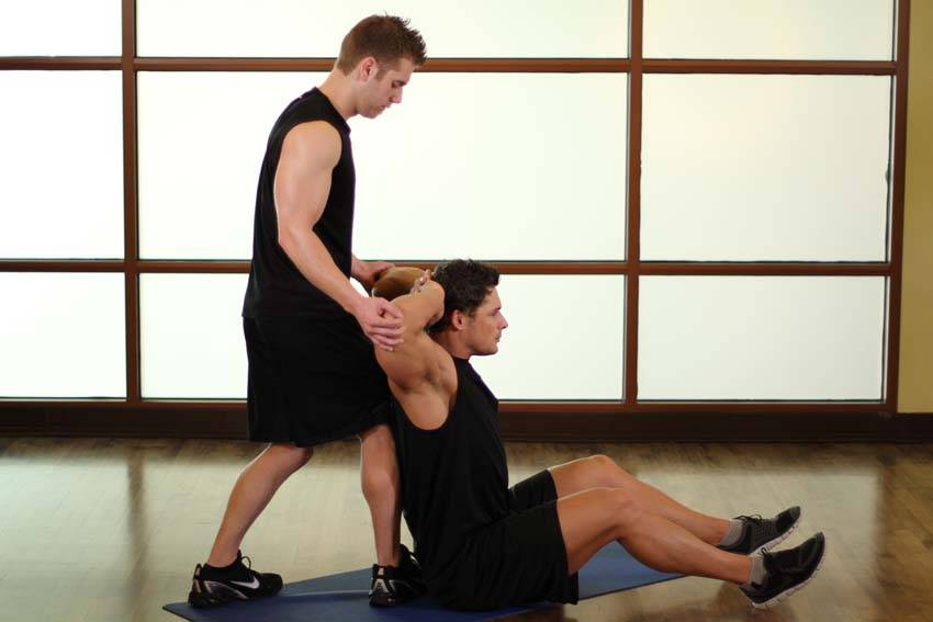 Alternative demonstration of Behind Head Chest Stretch exercise