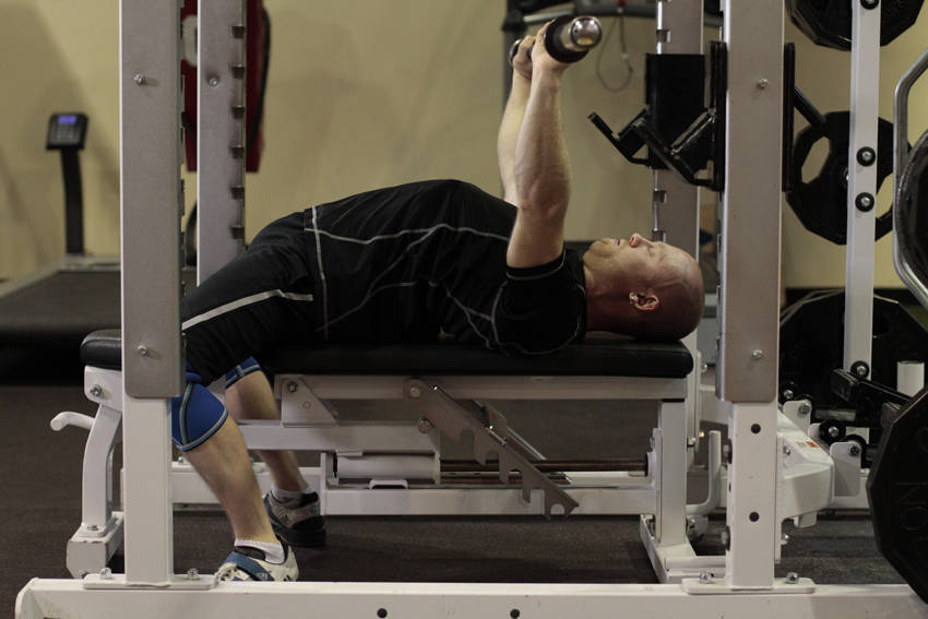 Demonstration of Bench Press - Powerlifting exercise showing proper form and technique