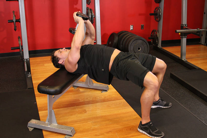Demonstration of Bent-Arm Dumbbell Pullover exercise showing proper form and technique