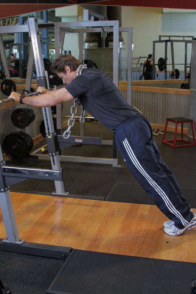 Demonstration of Body Tricep Press exercise showing proper form and technique