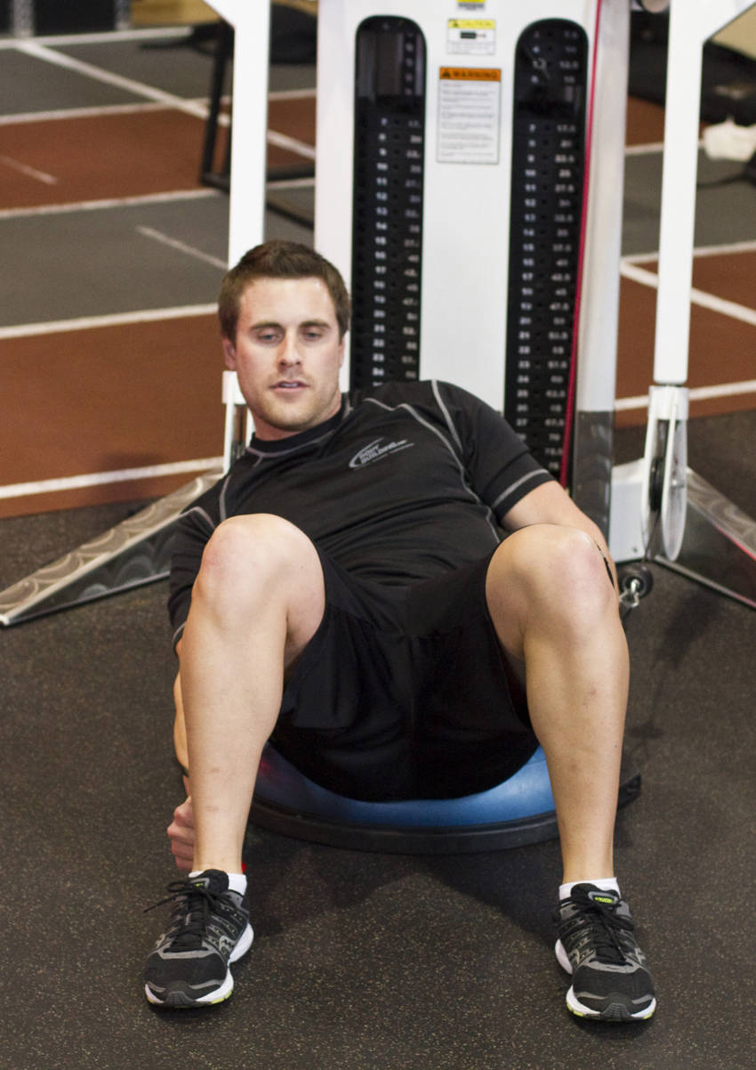 Alternative demonstration of Bosu Ball Cable Crunch With Side Bends exercise