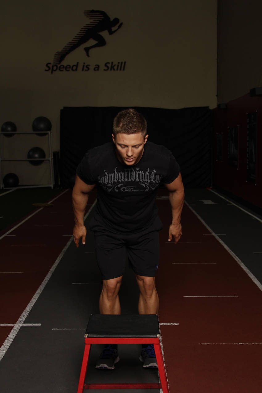 Demonstration of Box Jump (Multiple Response) exercise showing proper form and technique