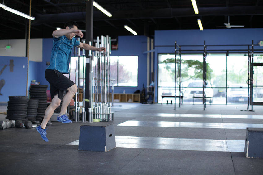 Demonstration of Box Skip exercise showing proper form and technique