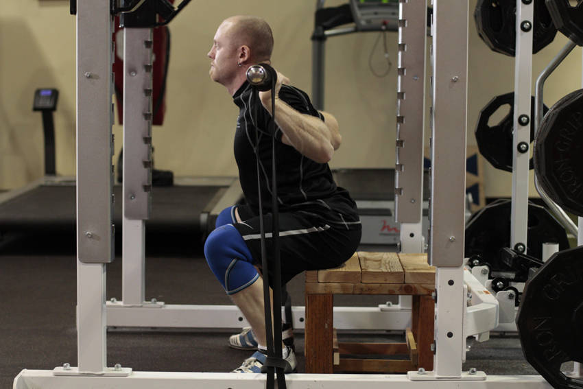 Alternative demonstration of Box Squat with Bands exercise