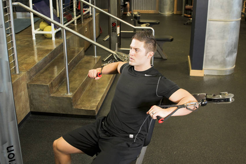 Demonstration of Cable Chest Press exercise showing proper form and technique