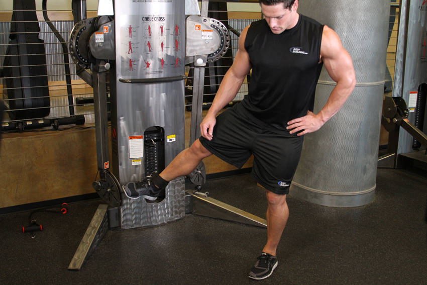 Demonstration of Cable Hip Adduction exercise showing proper form and technique