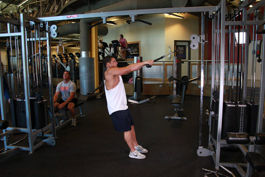 Demonstration of Cable Rope Rear-Delt Rows exercise showing proper form and technique