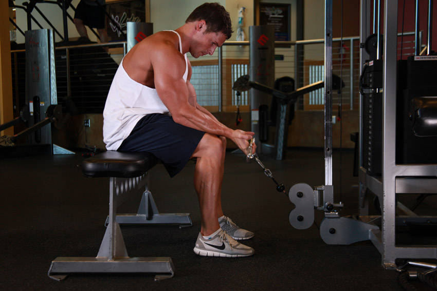 Demonstration of Cable Wrist Curl exercise showing proper form and technique
