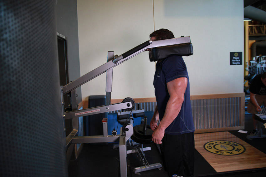 Alternative demonstration of Calf-Machine Shoulder Shrug exercise