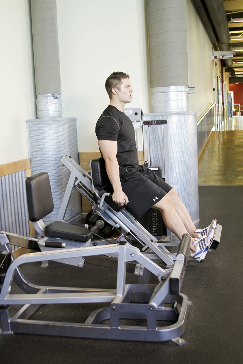 Demonstration of Calf Press exercise showing proper form and technique
