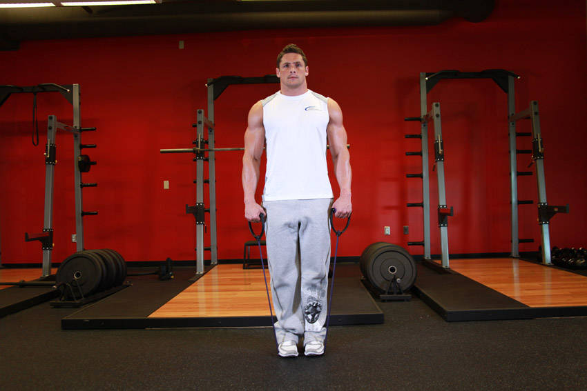 Demonstration of Calf Raises - With Bands exercise showing proper form and technique