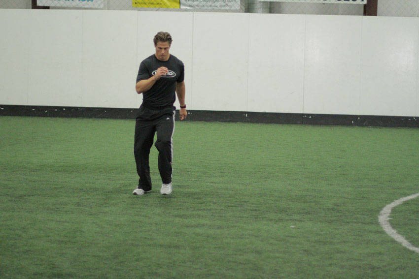 Demonstration of Carioca Quick Step exercise showing proper form and technique