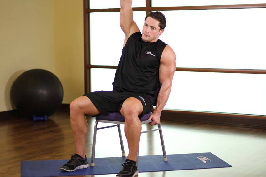 Alternative demonstration of Chair Lower Back Stretch exercise