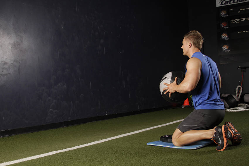 Demonstration of Chest Push (multiple response) exercise showing proper form and technique