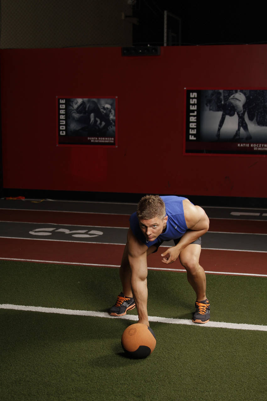 Demonstration of Chest Push from 3 point stance exercise showing proper form and technique