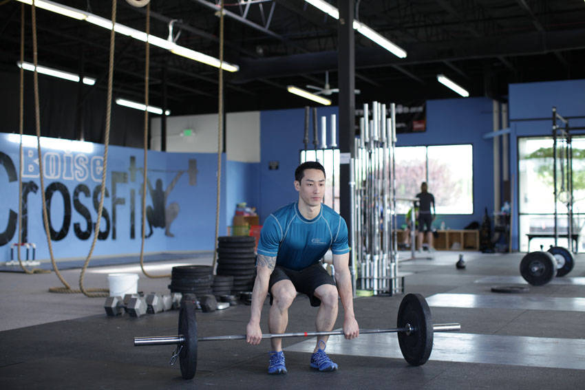 Demonstration of Clean and Press exercise showing proper form and technique