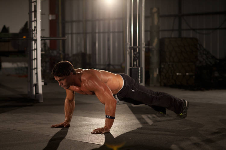 Demonstration of Clock Push-Up exercise showing proper form and technique