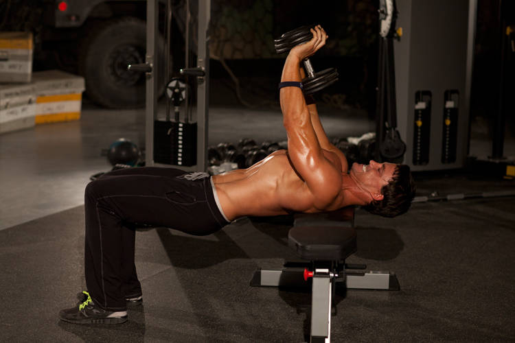 Demonstration of Close-Grip Dumbbell Press exercise showing proper form and technique