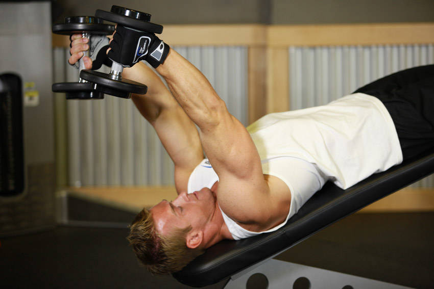 Demonstration of Decline Dumbbell Triceps Extension exercise showing proper form and technique