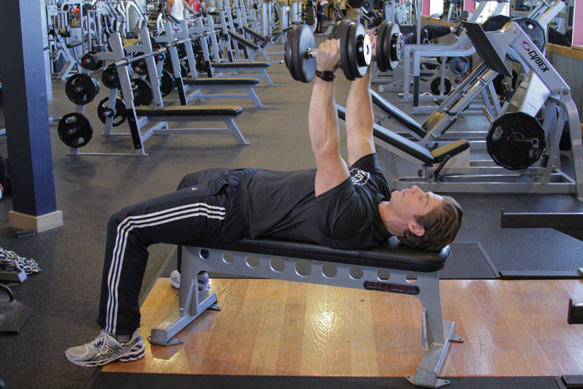 Demonstration of Dumbbell Bench Press with Neutral Grip exercise showing proper form and technique