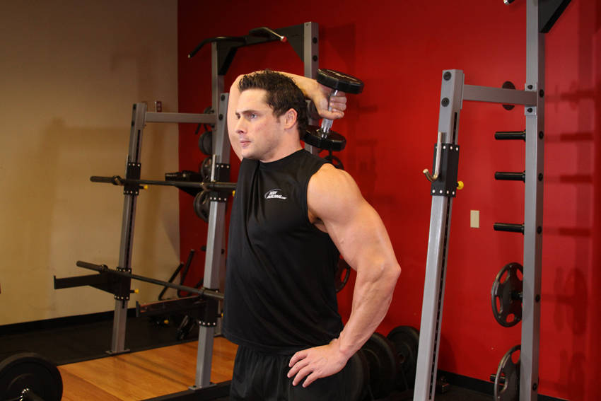 Demonstration of Dumbbell One-Arm Triceps Extension exercise showing proper form and technique