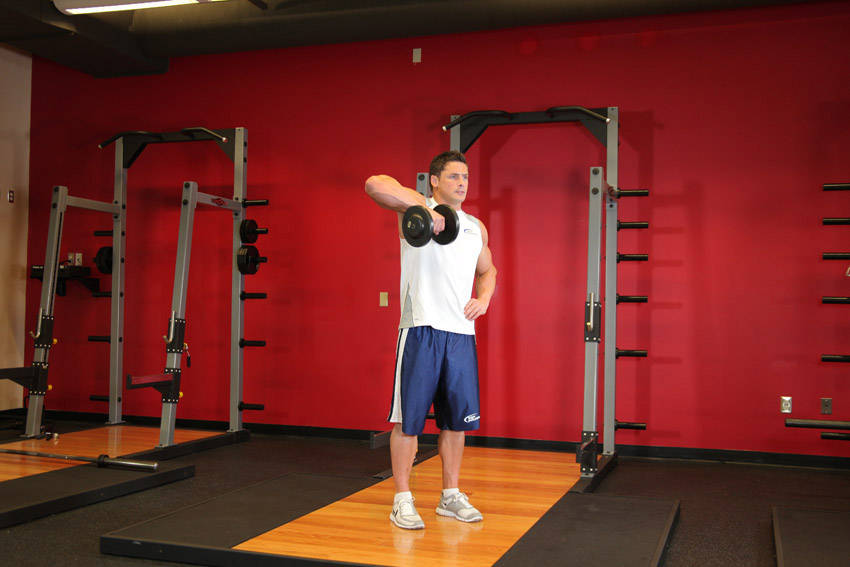 Demonstration of Dumbbell One-Arm Upright Row exercise showing proper form and technique