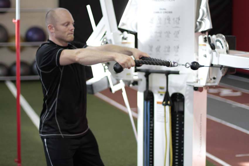 Demonstration of Face Pull exercise showing proper form and technique