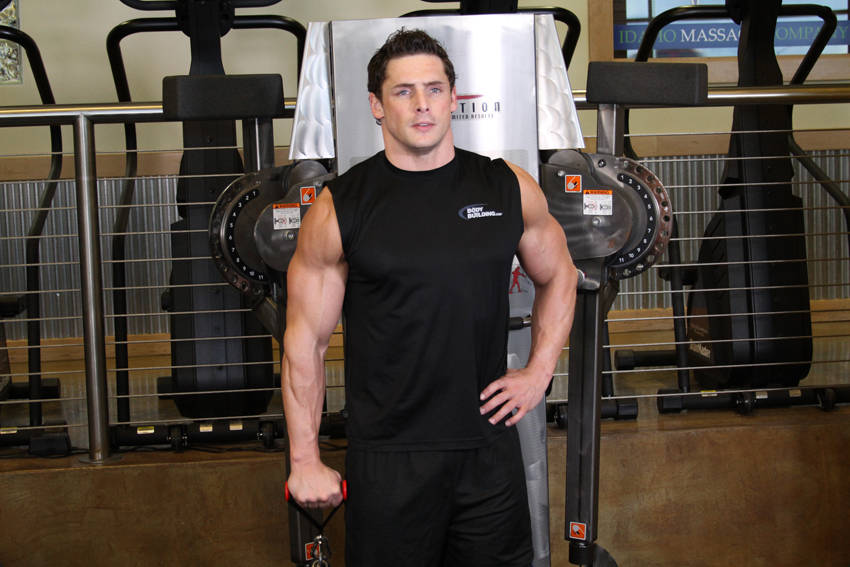 Demonstration of Front Cable Raise exercise showing proper form and technique