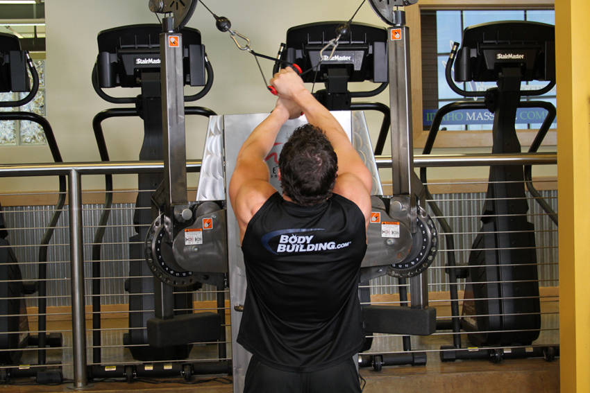 Demonstration of Full Range-Of-Motion Lat Pulldown exercise showing proper form and technique