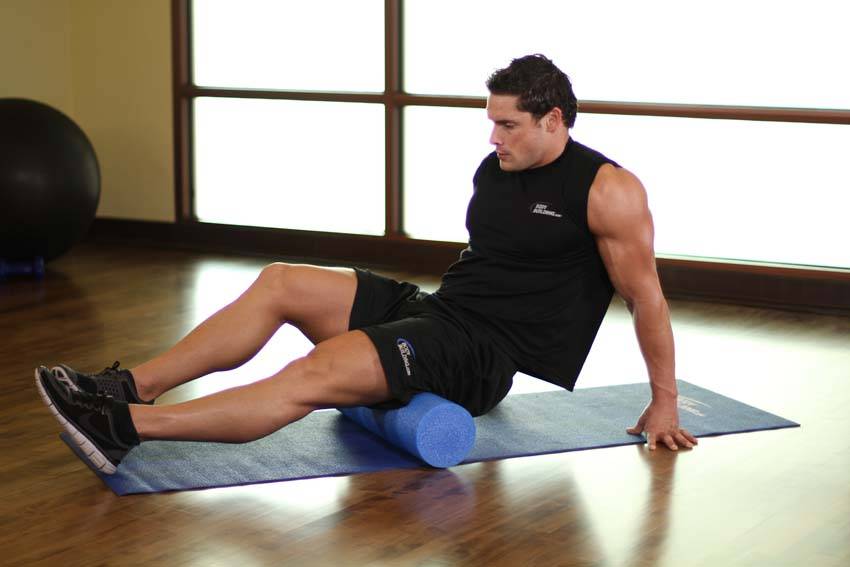 Demonstration of Hamstring-SMR exercise showing proper form and technique