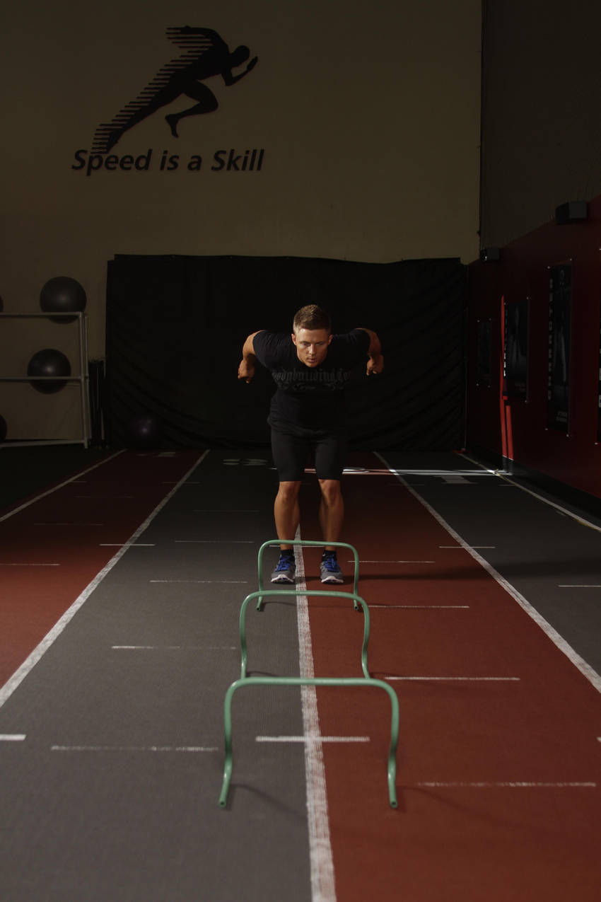 Demonstration of Hurdle Hops exercise showing proper form and technique