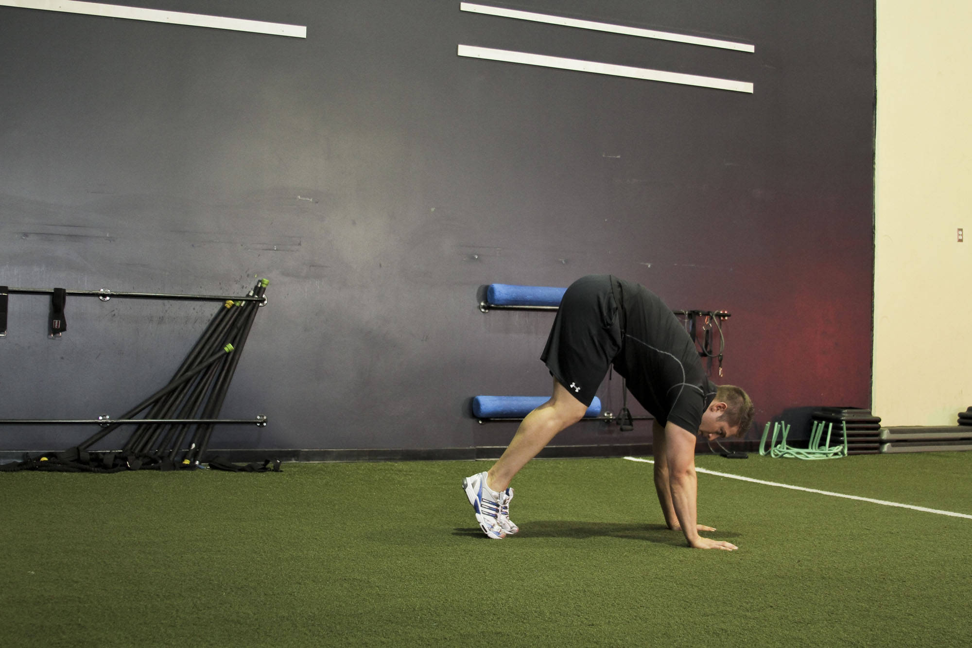 Demonstration of Inchworm exercise showing proper form and technique