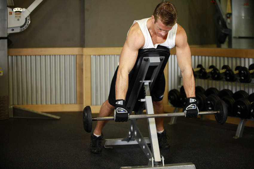 Demonstration of Incline Bench Pull exercise showing proper form and technique