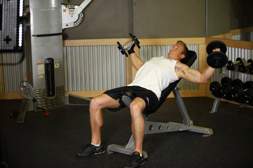 Demonstration of Incline Dumbbell Flyes - With A Twist exercise showing proper form and technique