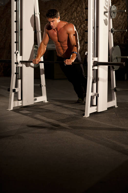 Demonstration of Incline Push-Up Medium exercise showing proper form and technique