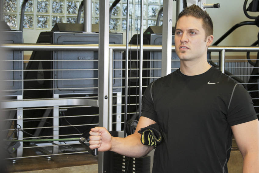 Demonstration of Internal Rotation with Band exercise showing proper form and technique
