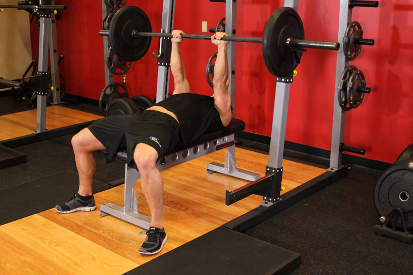Demonstration of JM Press exercise showing proper form and technique