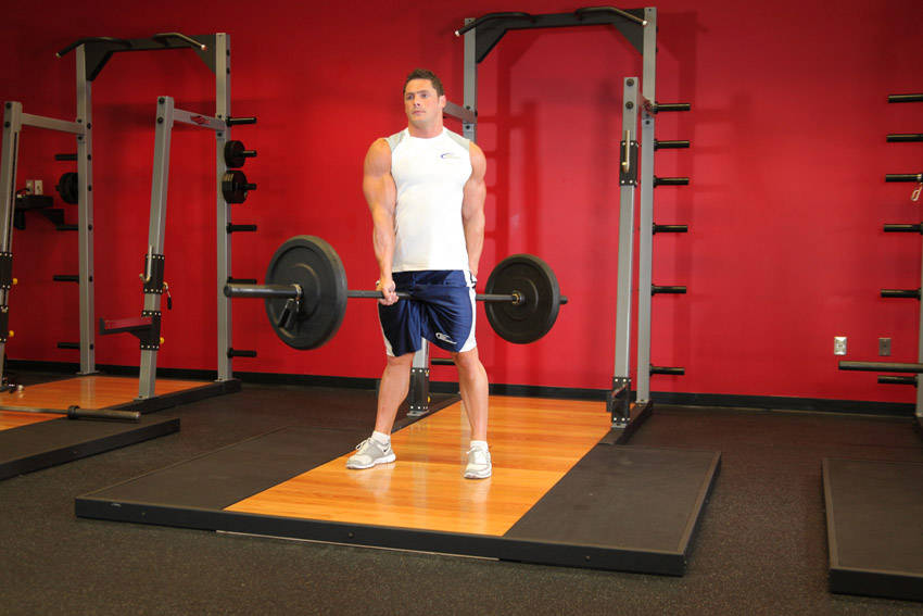 Demonstration of Jefferson Squats exercise showing proper form and technique