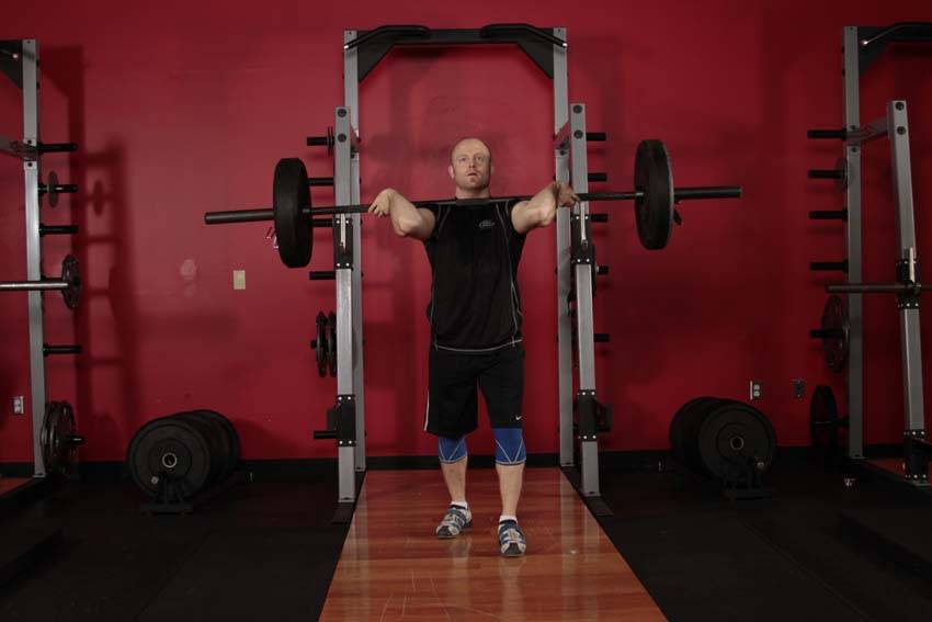 Demonstration of Jerk Balance exercise showing proper form and technique