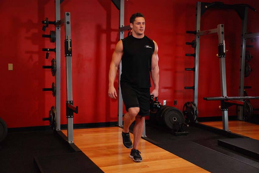 Demonstration of Kettlebell One-Legged Deadlift exercise showing proper form and technique