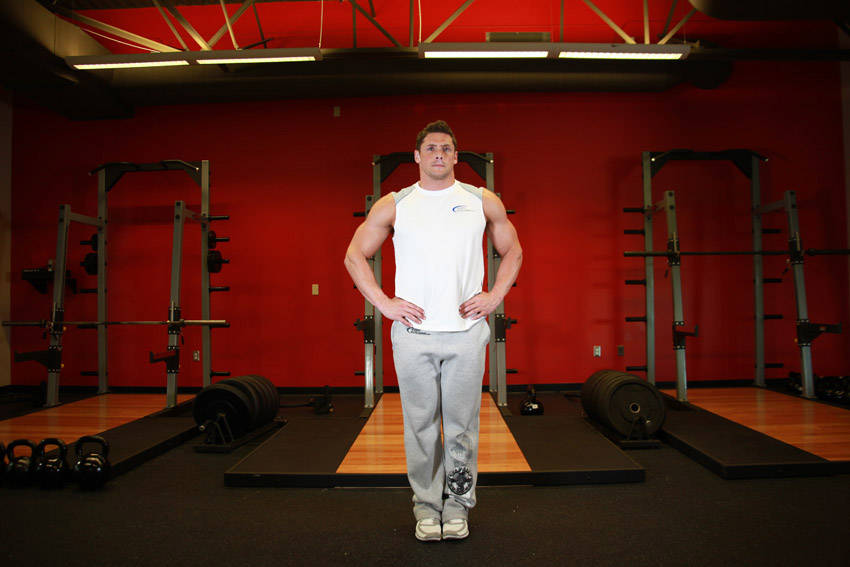 Demonstration of Knee Circles exercise showing proper form and technique