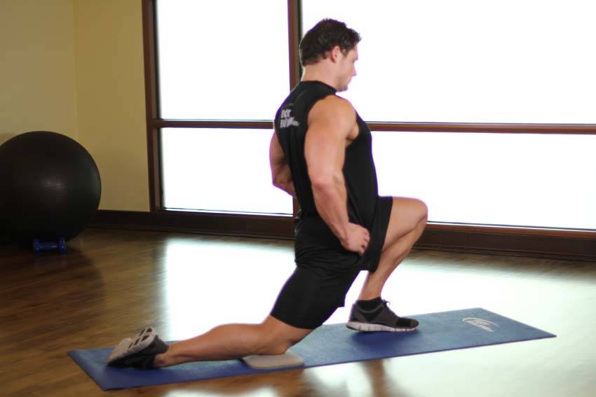 Demonstration of Kneeling Hip Flexor exercise showing proper form and technique