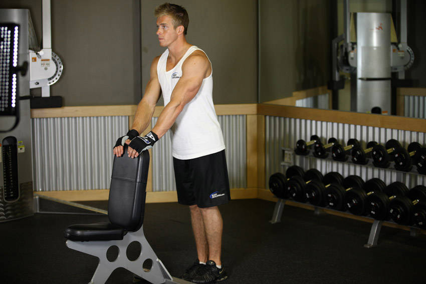 Demonstration of Leg Lift exercise showing proper form and technique